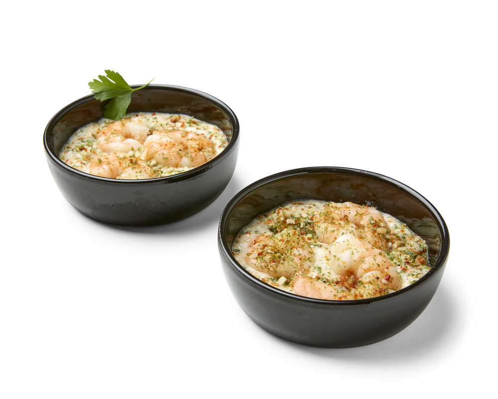 Cassolette de scampis vapeur à la sauce à l’ail (2 pièces)